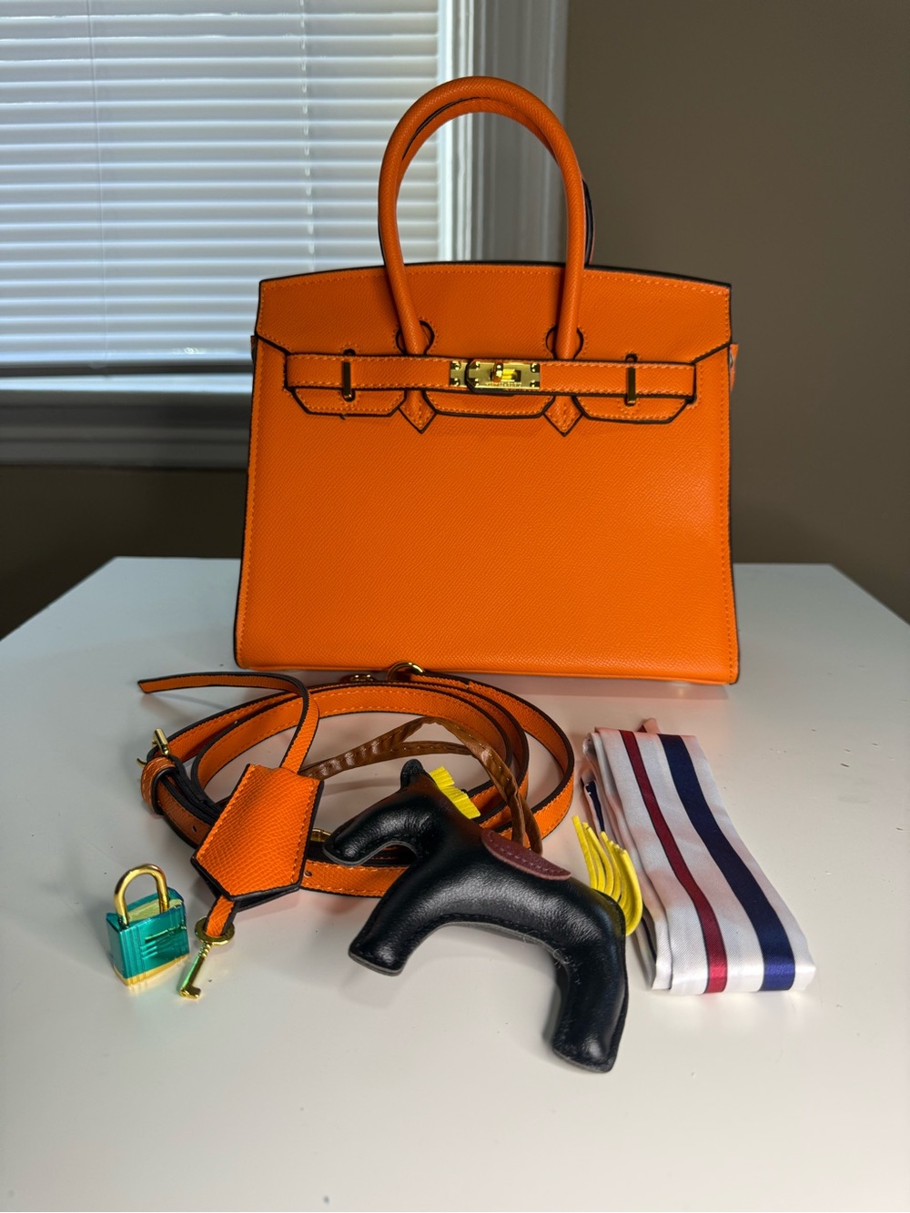Structured Orange Leather Satchel with Gold-Tone Accent